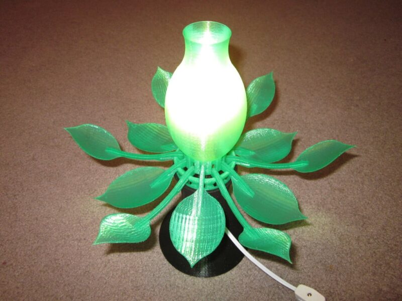 A green flower lamp is shown. 